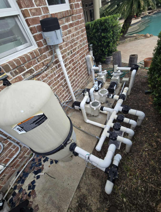 Pool repair specialist repairing residential swimming pool in Sugar Land TX