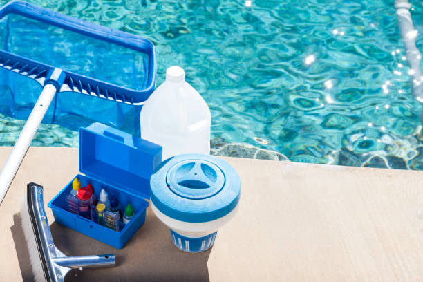 Professional testing phosphate levels in residential pool water