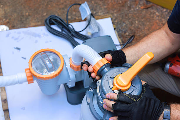 Pool technician repairing cracked pool surfaces