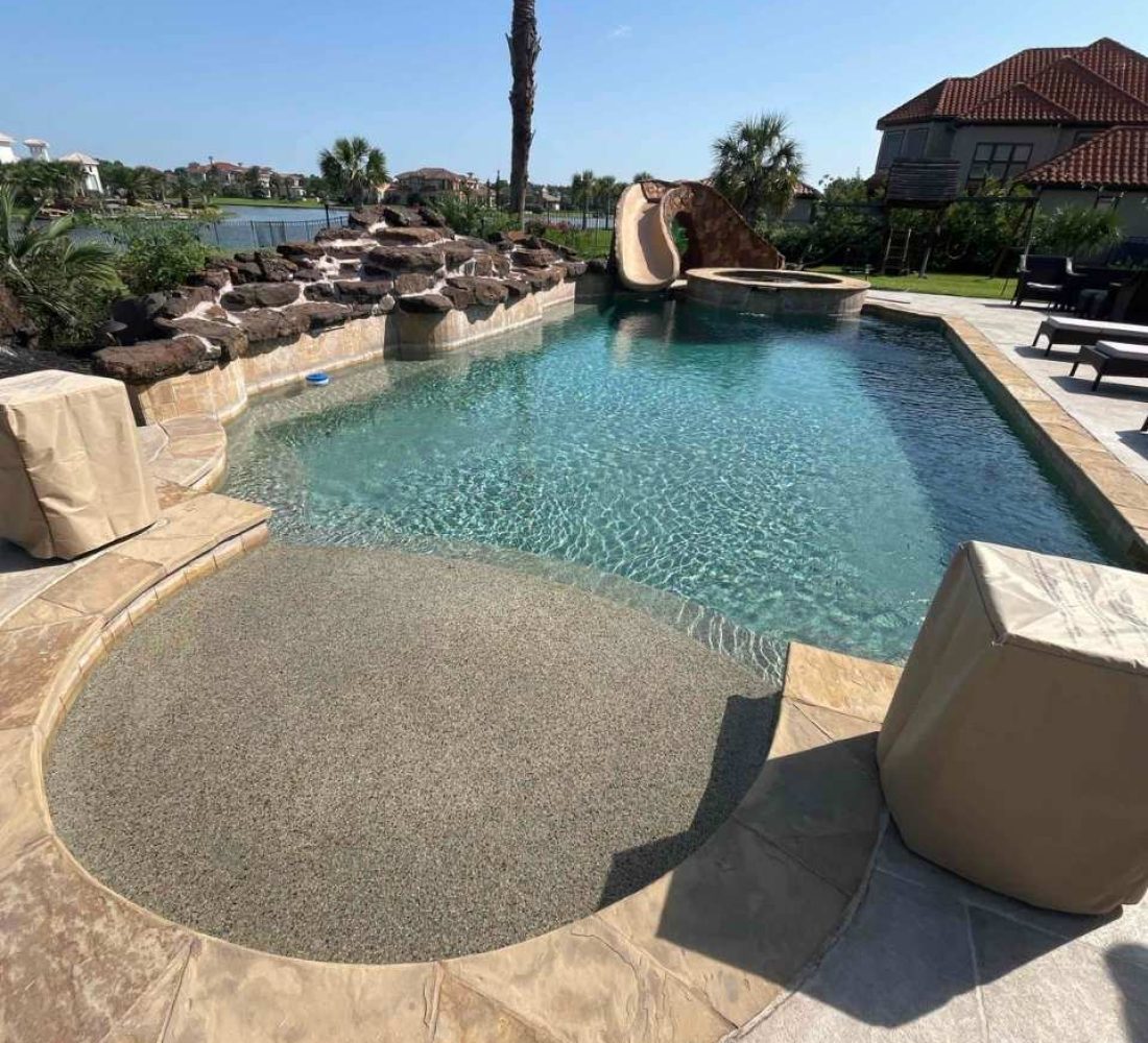 An inground pool cleaned by ACORB POOLS with weekly pool maintenance