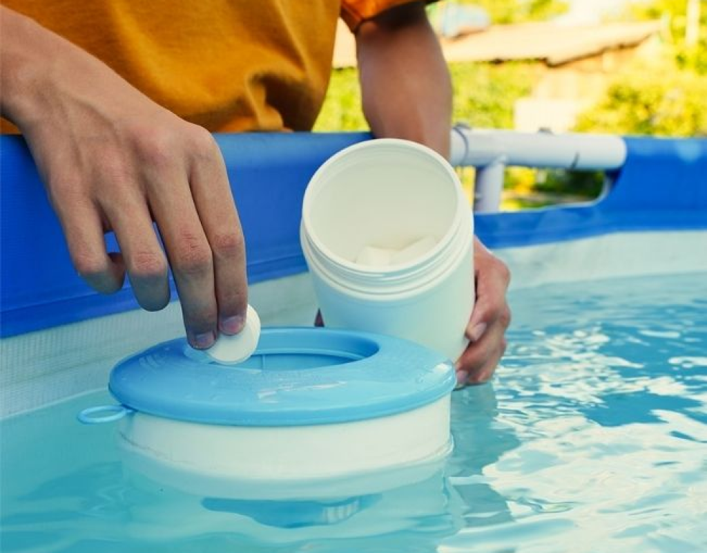 Swimming pool water treatment service for phosphate removal